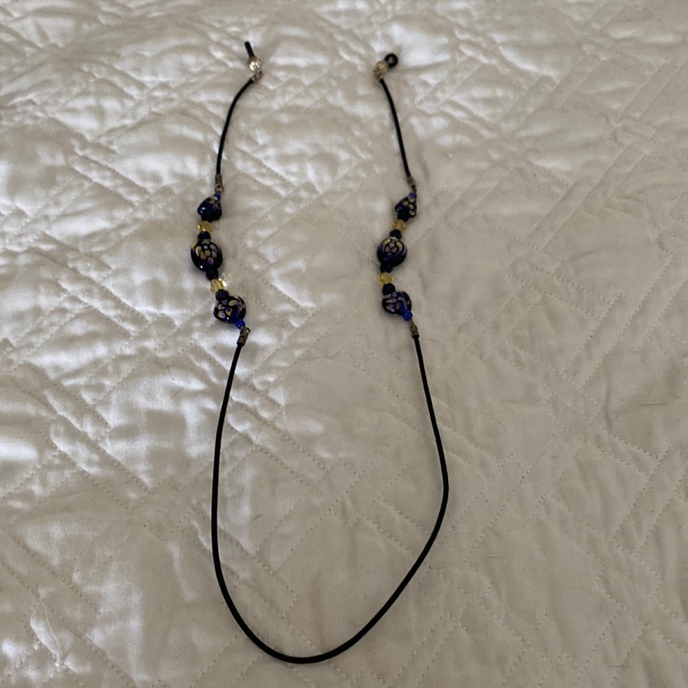 Around the neck eyeglass holder